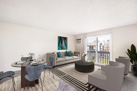 Living and dining area, sunny glass sliding doors with a view of grass lawn. Staged with a couch, 2 chairs, table, dining set and a plant.at Wildflower, Kennewick, 99336